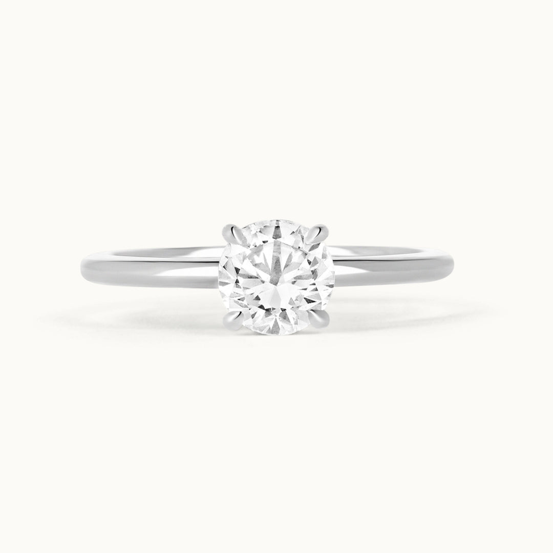 Primrose Ring in 18K recycled white gold, designed as a classic solitaire engagement ring with a brilliant lab-grown diamond. Ethically handcrafted in Antwerp.