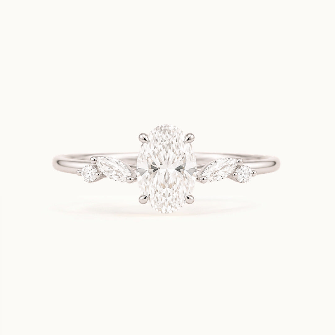 Willow oval lab-grown diamond engagement ring with marquise leaf accents in recycled 18K white gold
