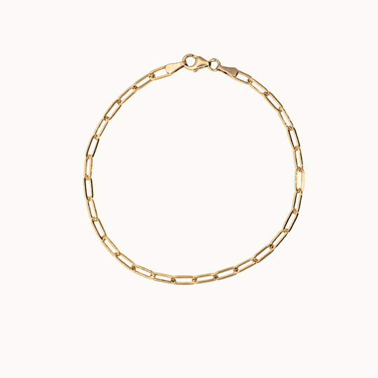 18 carat gold paperclip chunky chain bracelet on a white background
