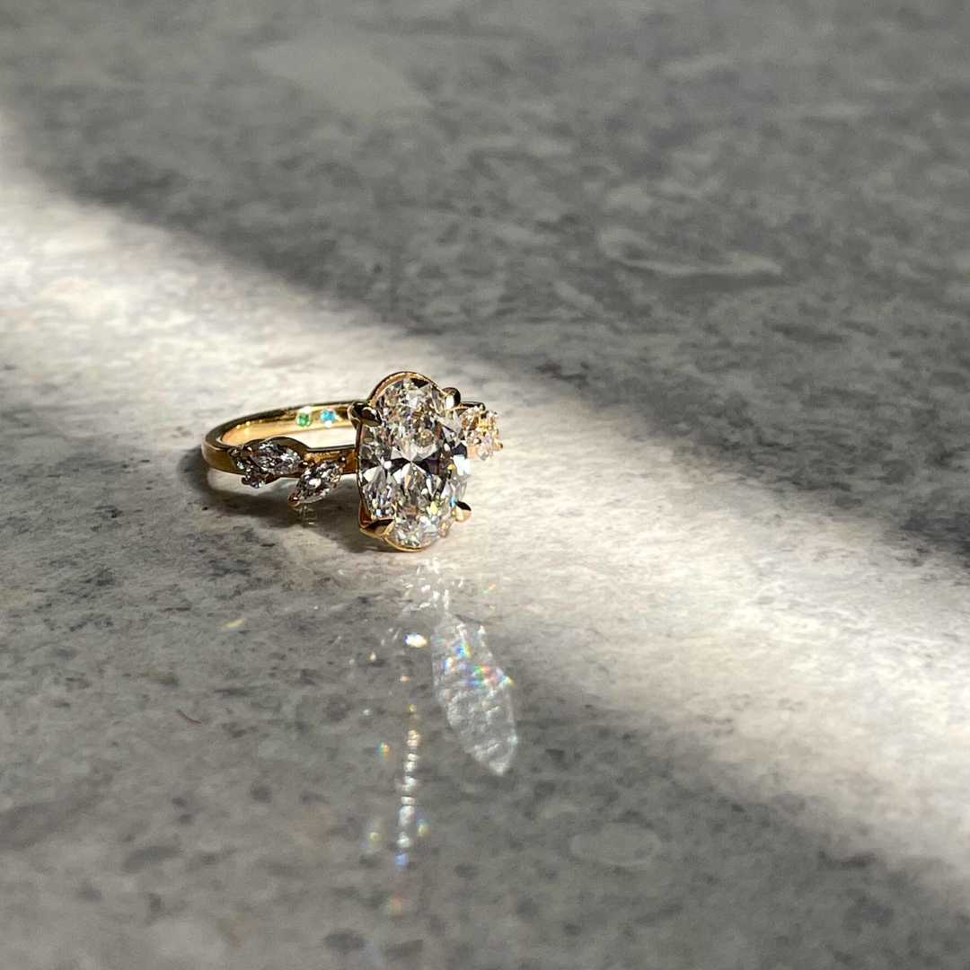 Willow oval lab-grown diamond engagement ring with leaf accents in yellow gold