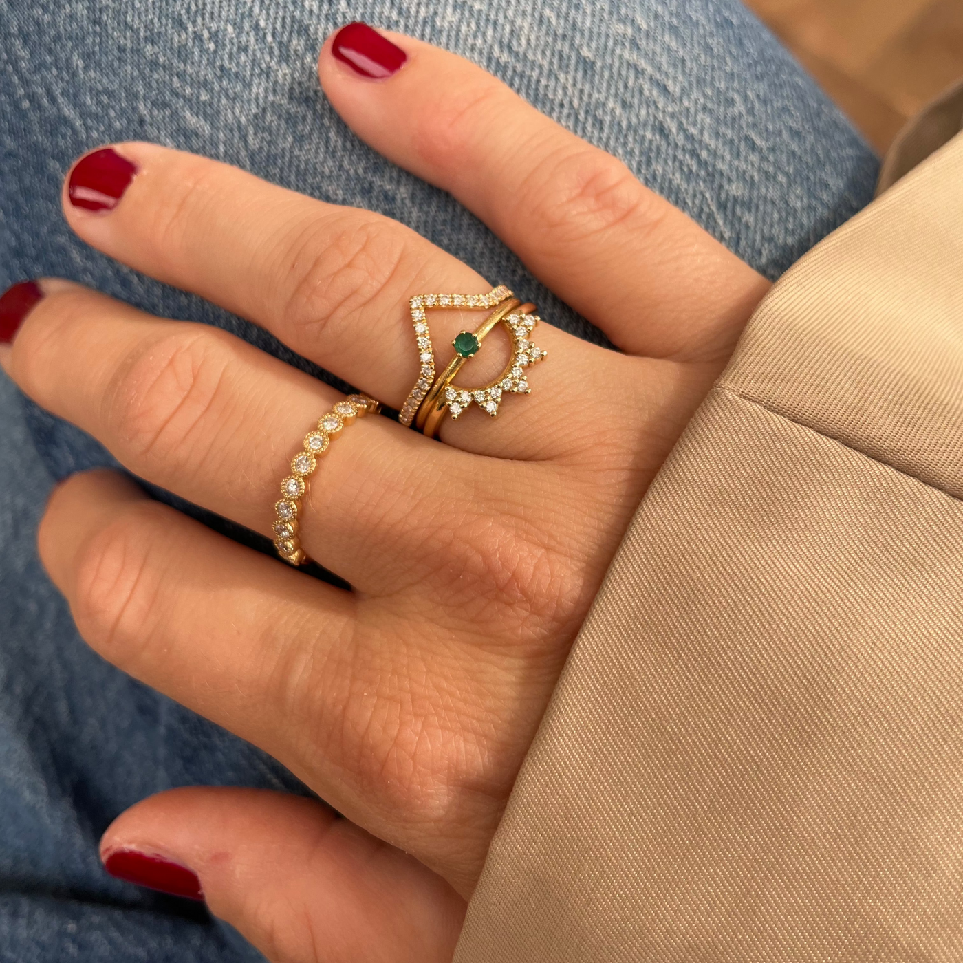 Avery Ring stacked with the Marigold Ring and a diamond band on the hand