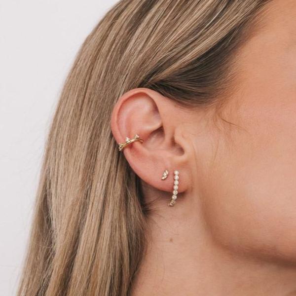 Model wearing the Rosemary Ear Cuff in an ear stack