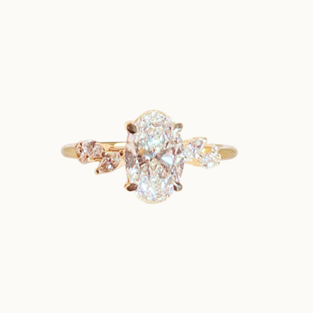One of a Kind Engagement Ring in recycled 18K yellow gold with oval and marquise-shaped lab-grown diamonds