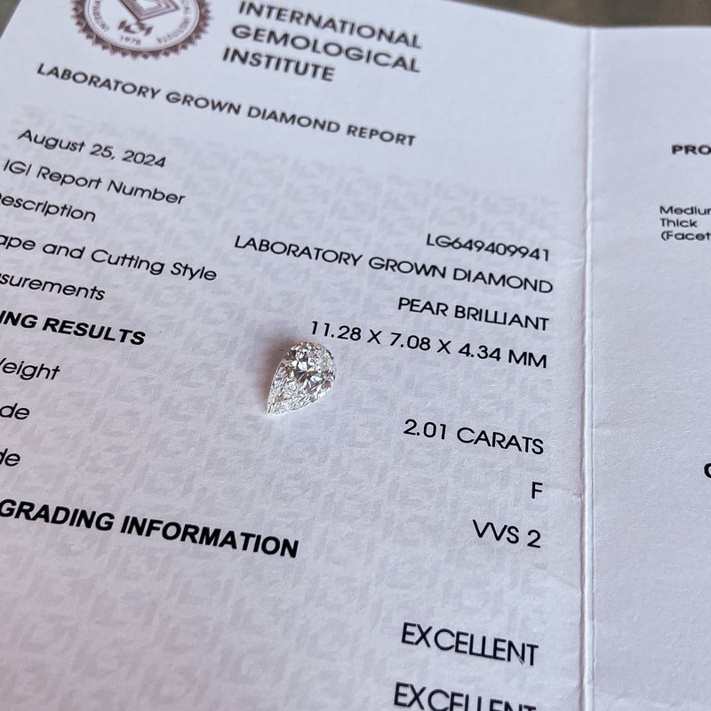 IGI laboratory-grown diamond report with a pear-cut lab-grown diamond
