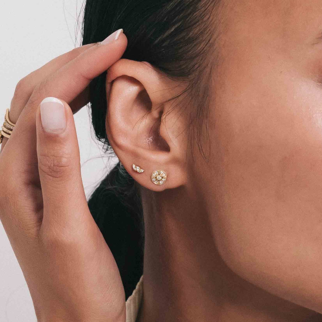 Model wearing the Violet Stud in an ear stack