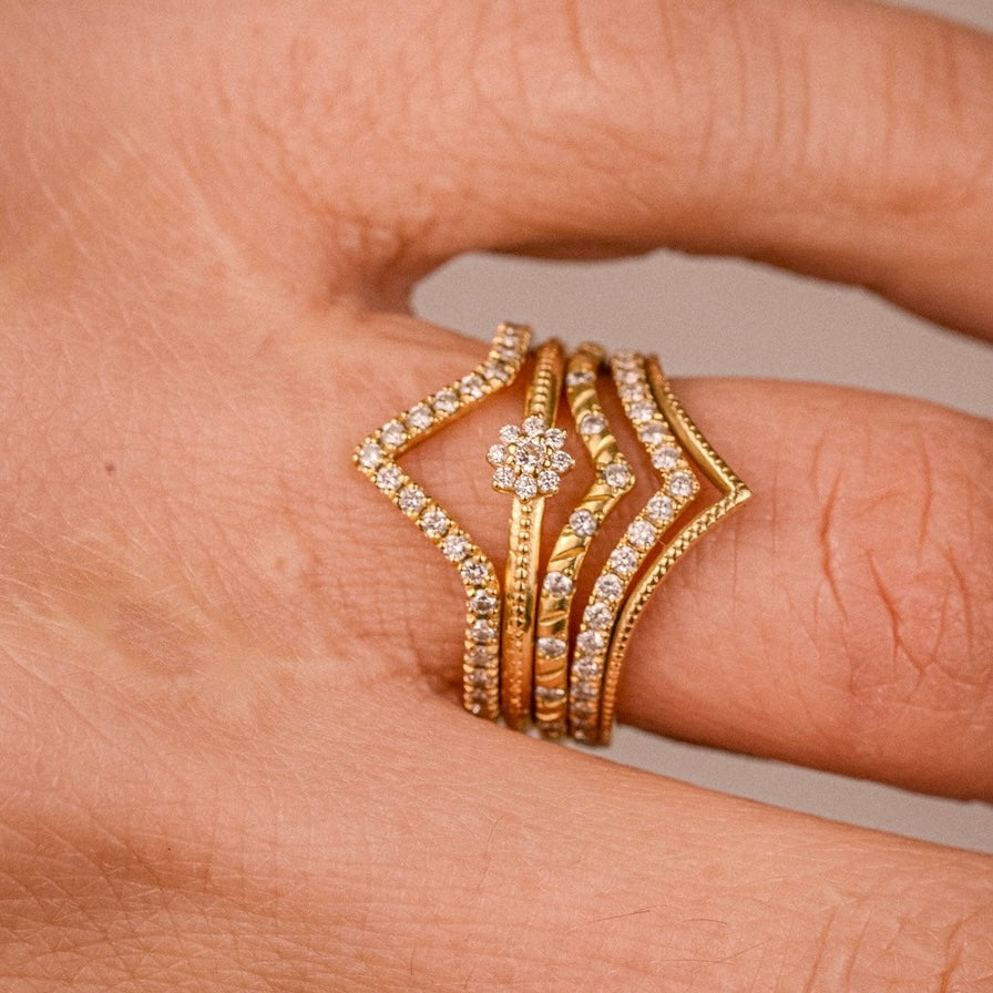 Flora Ring worn in a stack – 18k gold floral ring with lab-grown diamonds