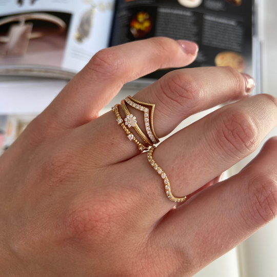 Flora Ring worn in a stack – 18k gold floral ring with lab-grown diamonds