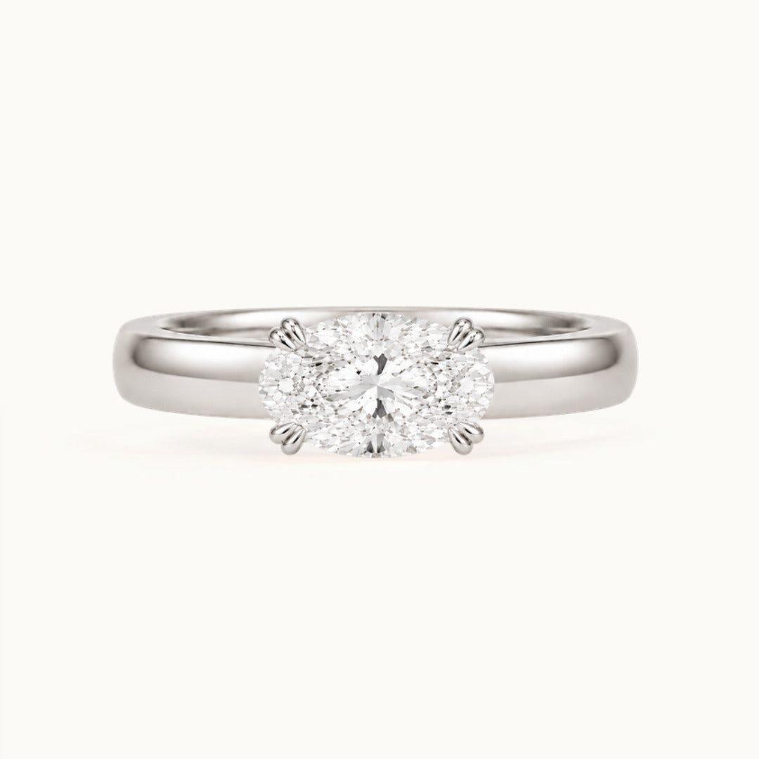 Genevieve Ring, an east-west oval lab-grown diamond on a wide band, recycled 18K white gold
