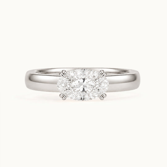 Genevieve Ring, an east-west oval lab-grown diamond on a wide band, recycled 18K white gold