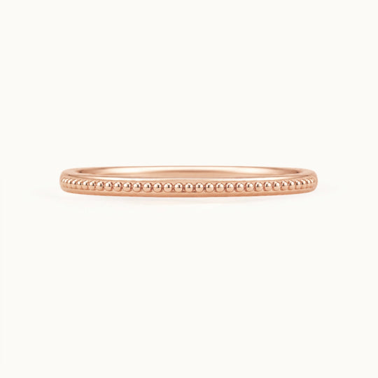 Laurel Band, a beaded wedding band in recycled 18K rose gold