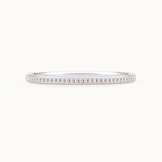Laurel Band, a beaded wedding band in recycled 18K white gold