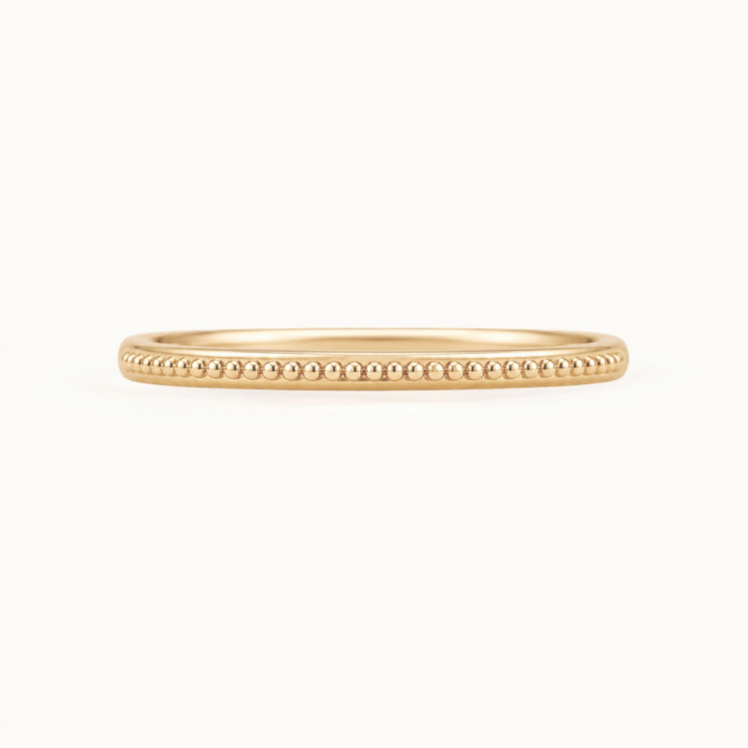 Laurel Band, a beaded wedding band in recycled 18K yellow gold
