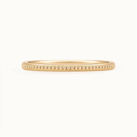 Laurel Band, a beaded wedding band in recycled 18K yellow gold