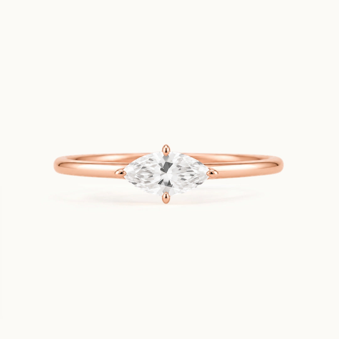 Margot Ring, an east-west marquise lab-grown diamond on a slim band, recycled 18K rose gold