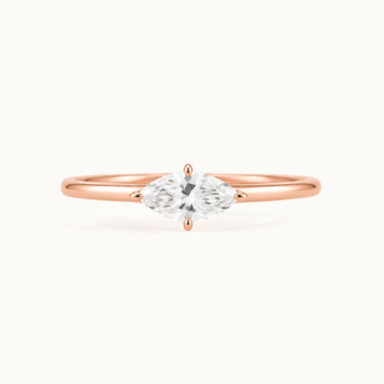 Margot Ring, an east-west marquise lab-grown diamond on a slim band, recycled 18K rose gold