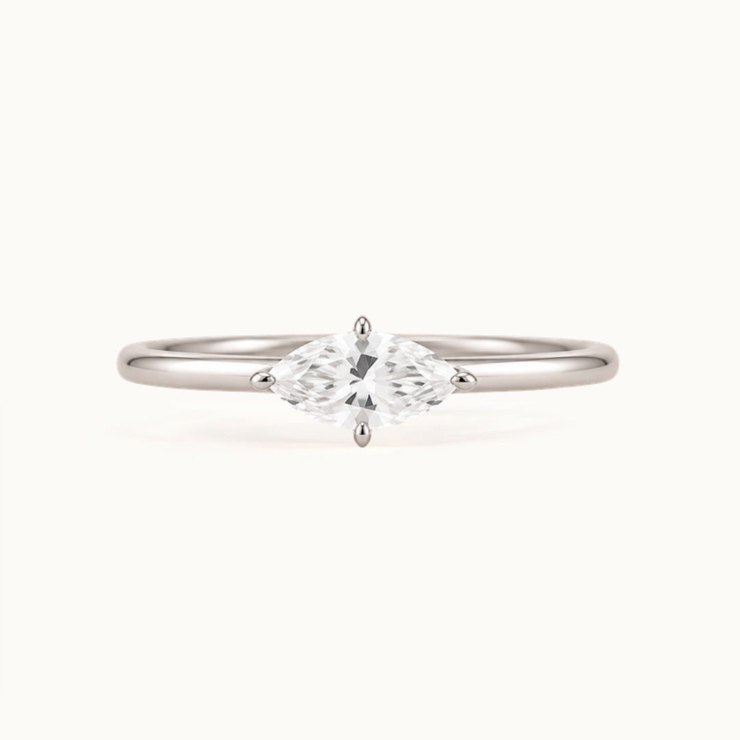 Margot Ring, an east-west marquise lab-grown diamond on a slim band, recycled 18K white gold