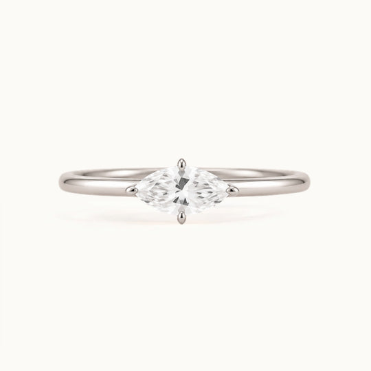 Margot Ring, an east-west marquise lab-grown diamond on a slim band, recycled 18K white gold
