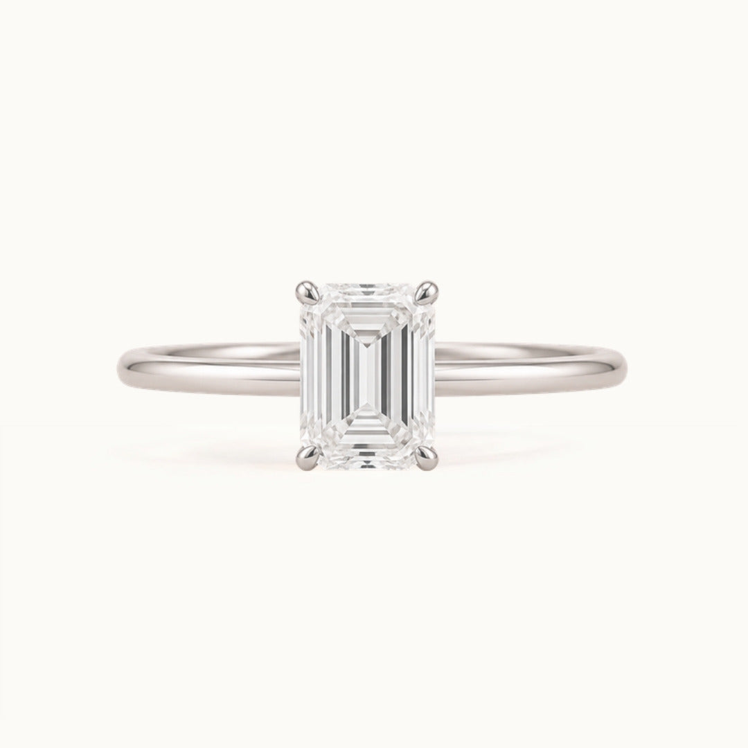Primrose Emerald Ring, an emerald-cut lab-grown diamond solitaire in recycled 18K white gold