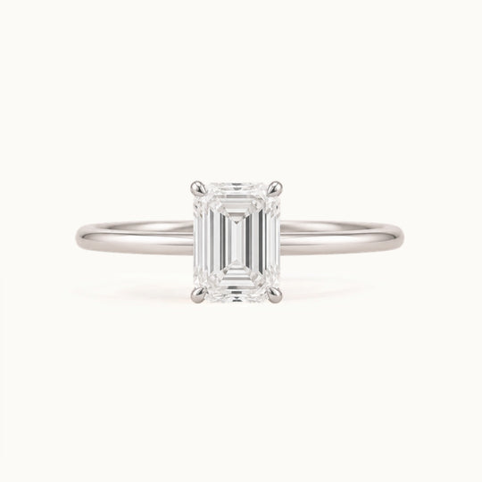 Primrose Emerald Ring, an emerald-cut lab-grown diamond solitaire in recycled 18K white gold