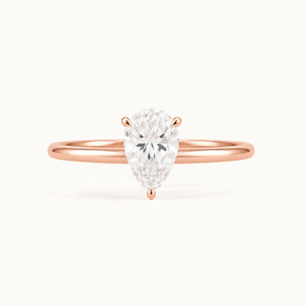 Primrose Pear Ring, a pear-shaped lab-grown diamond solitaire in recycled 18K rose gold