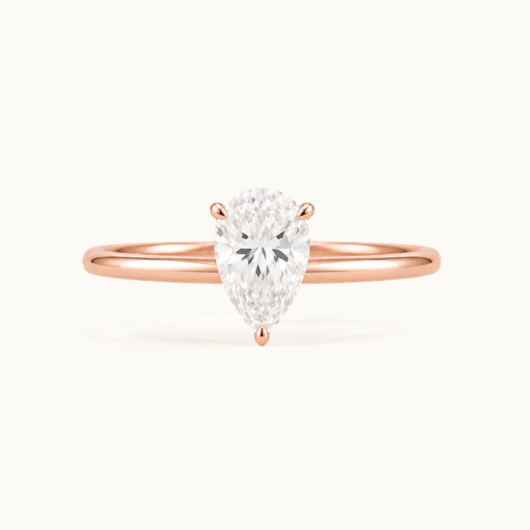 Primrose Pear Ring, a pear-shaped lab-grown diamond solitaire in recycled 18K rose gold