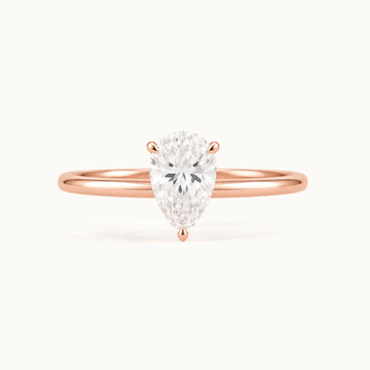 Primrose Pear Ring, a pear-shaped lab-grown diamond solitaire in recycled 18K rose gold
