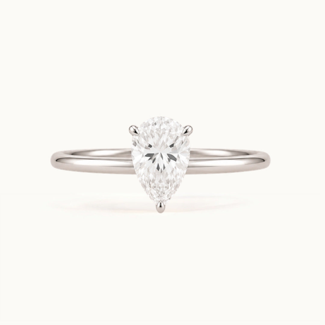 Primrose Pear Ring, a pear-shaped lab-grown diamond solitaire in recycled 18K white gold