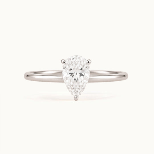 Primrose Pear Ring, a pear-shaped lab-grown diamond solitaire in recycled 18K white gold