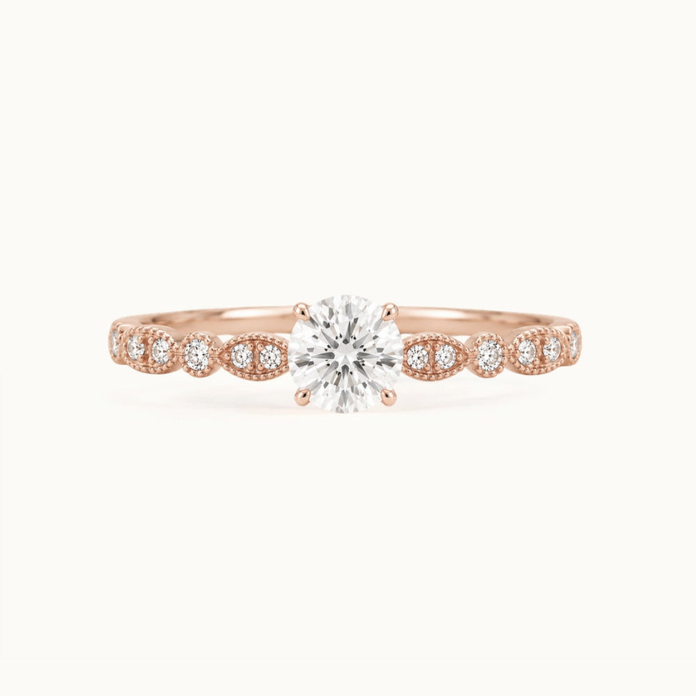 Viola Ring, a round lab-grown diamond on a milgrain diamond band, recycled 18K rose gold