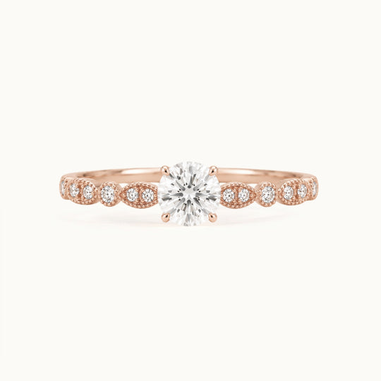 Viola Ring, a round lab-grown diamond on a milgrain diamond band, recycled 18K rose gold