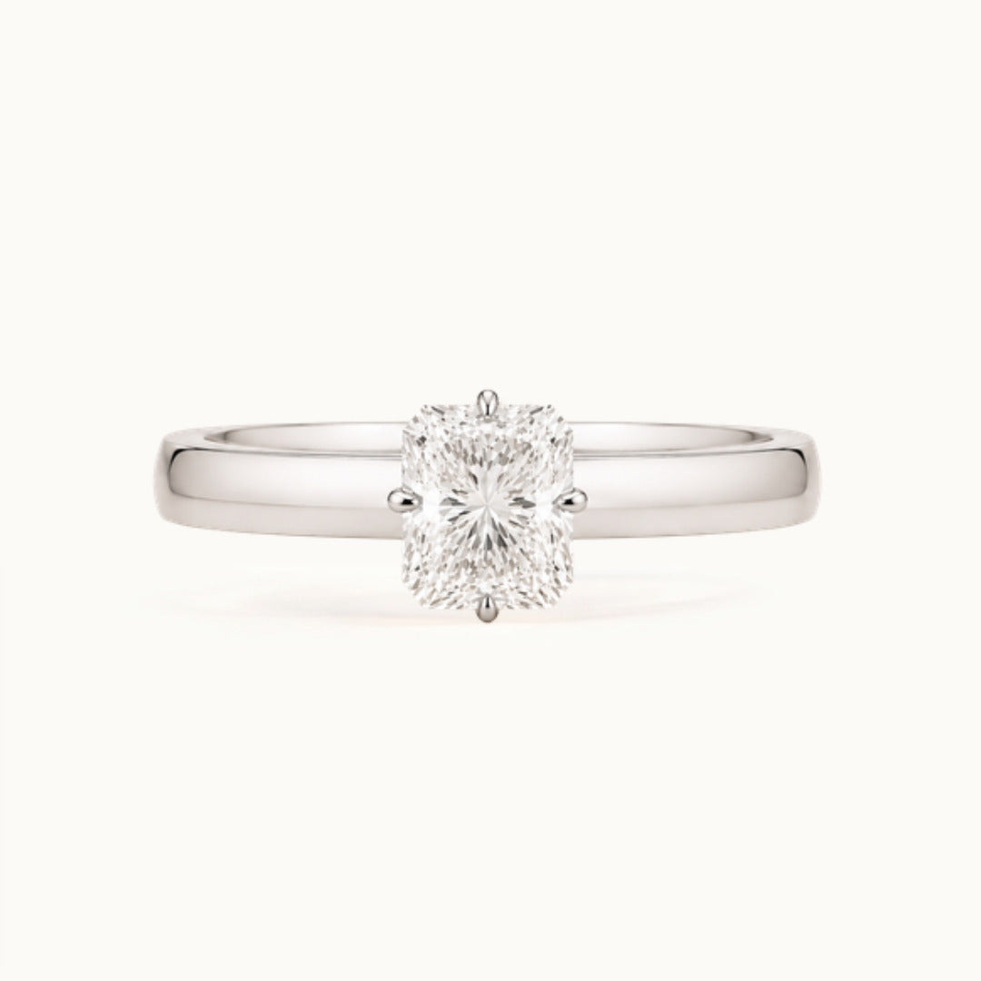 Vivienne Ring, a radiant-cut lab-grown diamond solitaire on a wide band, recycled 18K white gold
