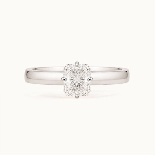 Vivienne Ring, a radiant-cut lab-grown diamond solitaire on a wide band, recycled 18K white gold
