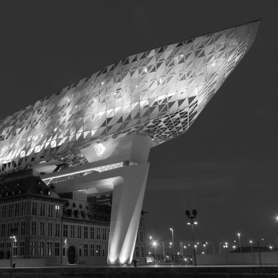 Antwerp Port House at night, the city where JUNA FAE crafts its engagement rings in their in house Antwerp atelier