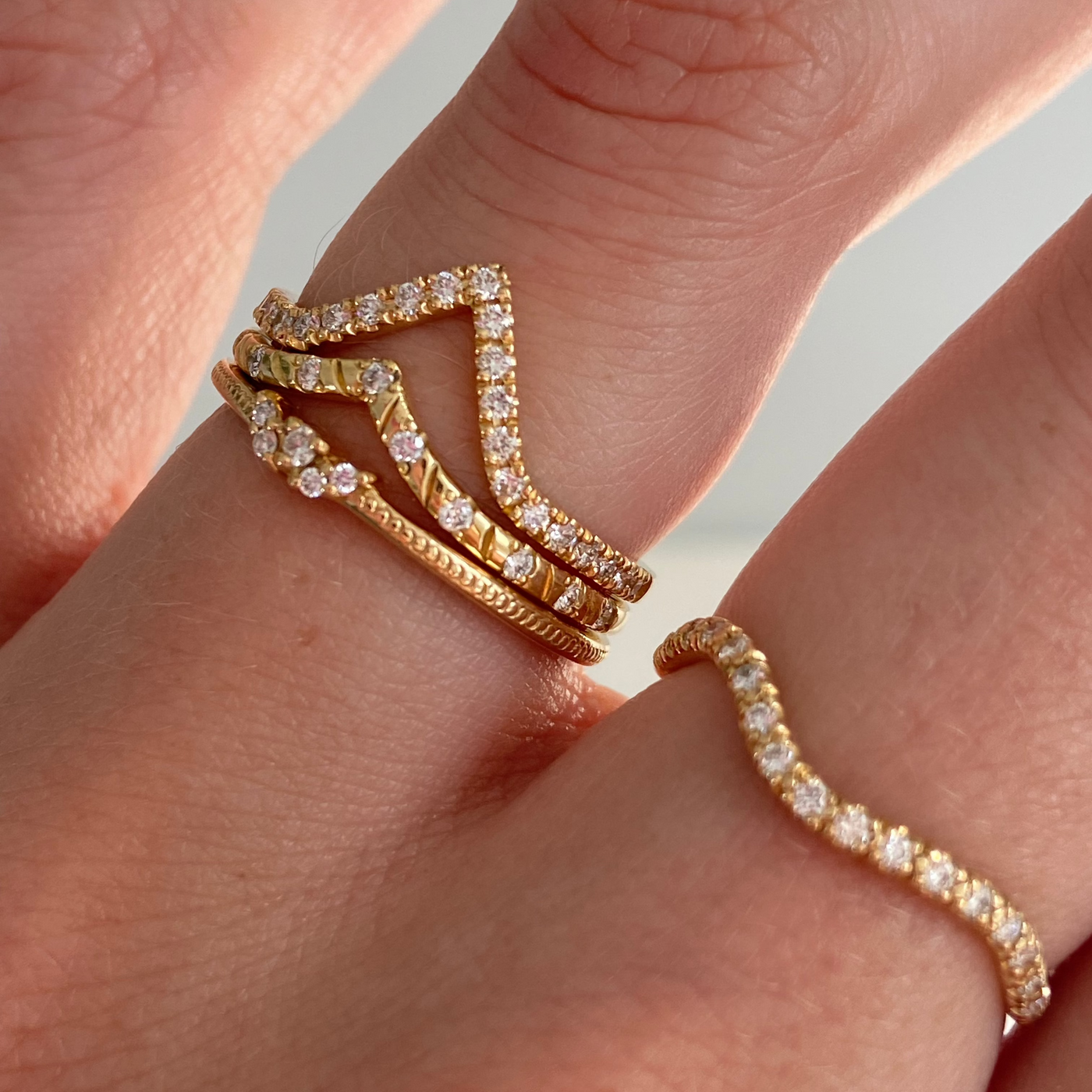 Lavender Ring stacked with the Alyssa Ring and Avery Ring, Cordelia Ring on the next finger
