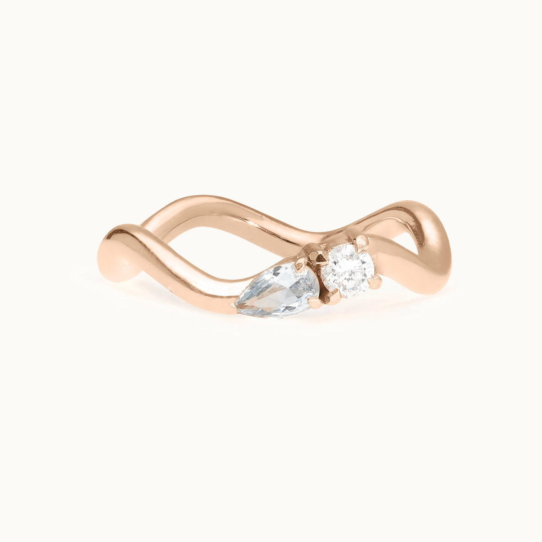 Seaside Serenade diamond and aquamarine wave engagement ring in recycled 18K rose gold