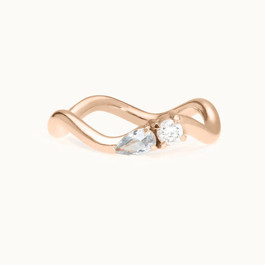 Seaside Serenade diamond and aquamarine wave engagement ring in recycled 18K rose gold