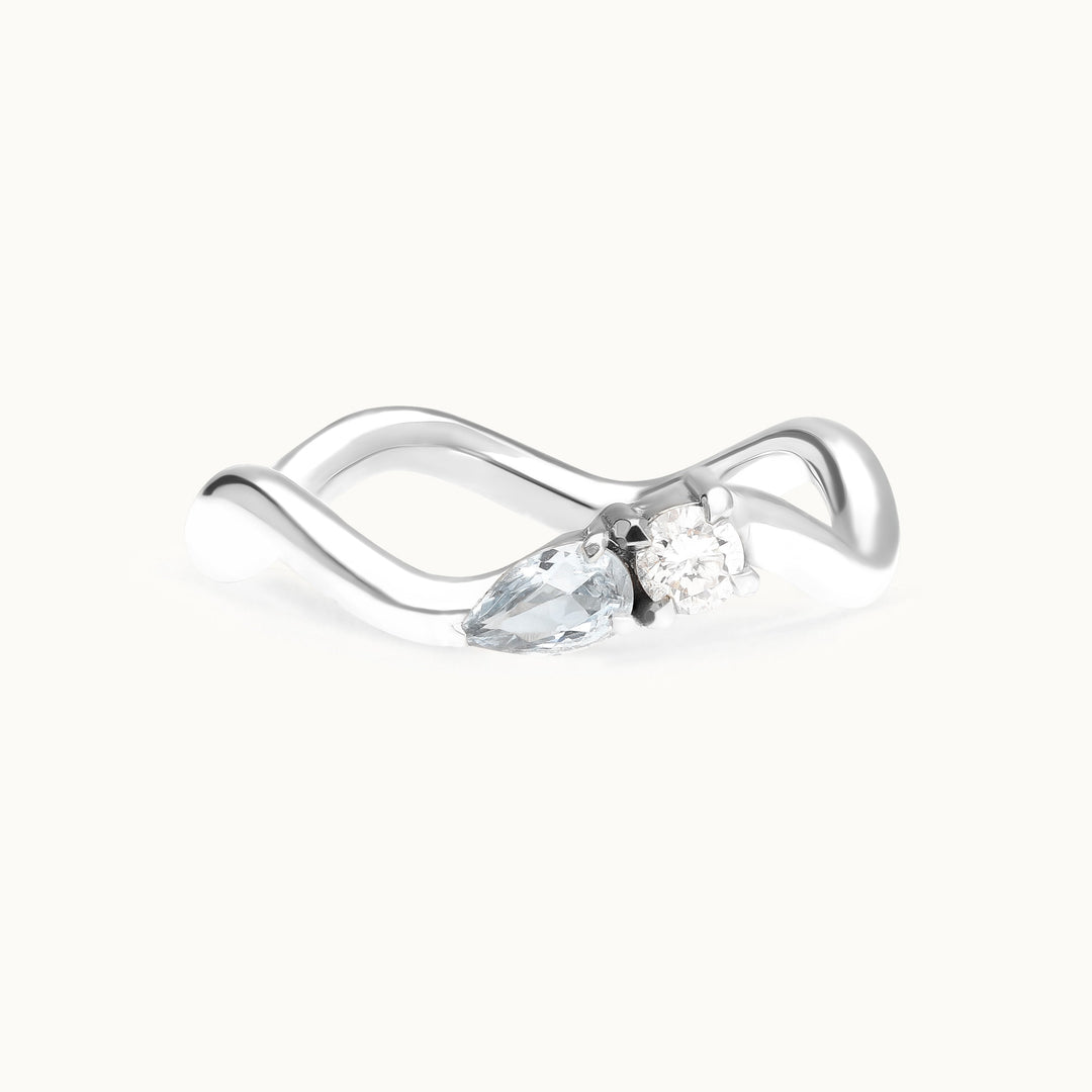 Seaside Serenade diamond and aquamarine wave engagement ring in recycled 18K white gold