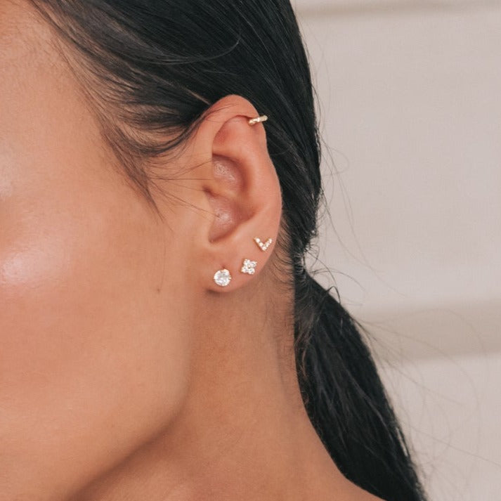 Model wearing the Heather Stud in an ear stack