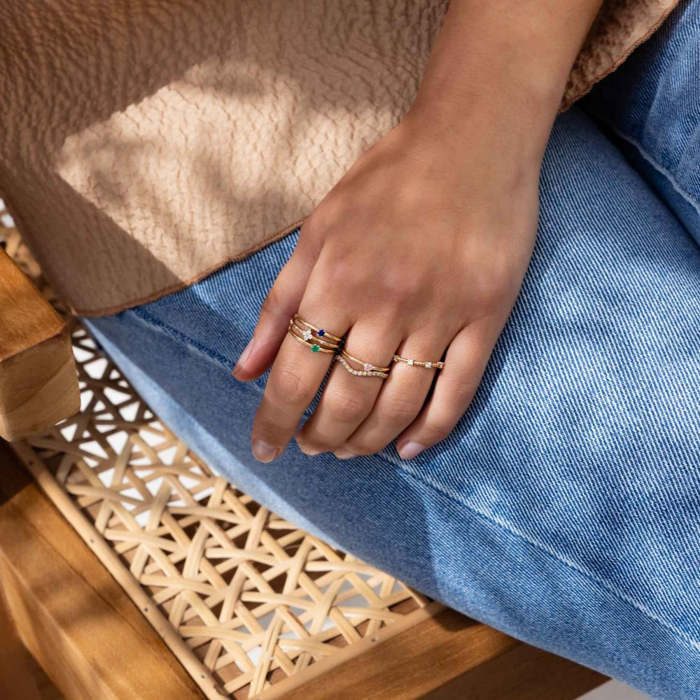 Iris Ring worn on the hand with other fine stacking rings
